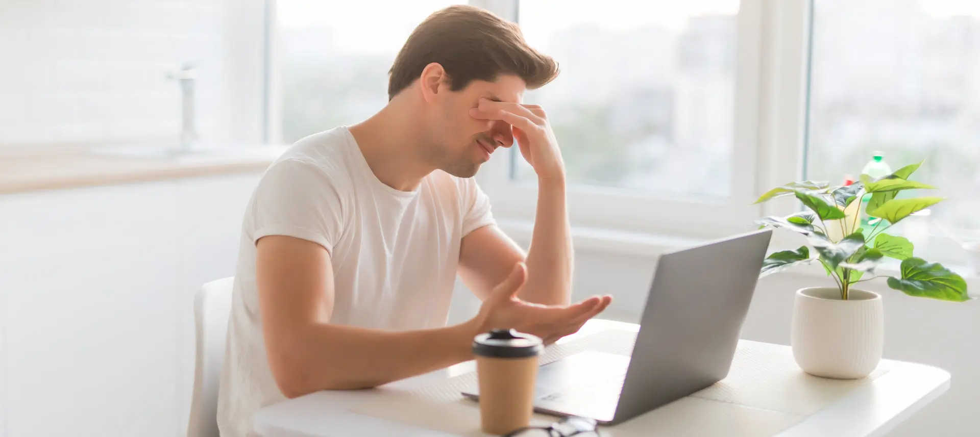 man frustrated laptop