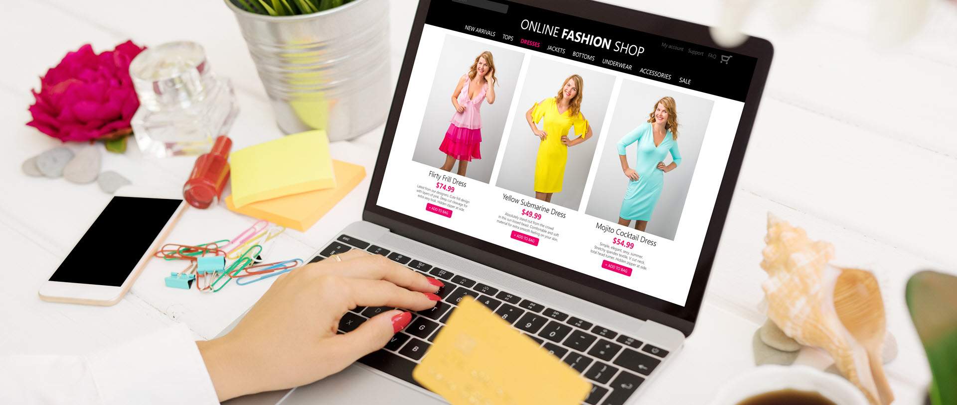 online fashion store on laptop at a woman's desk